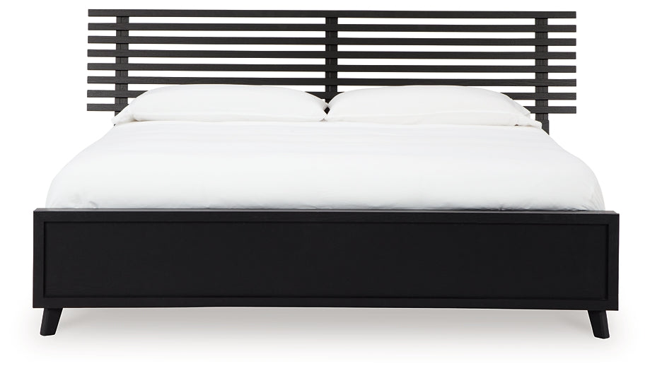 Danziar King Panel Bed with Mirrored Dresser